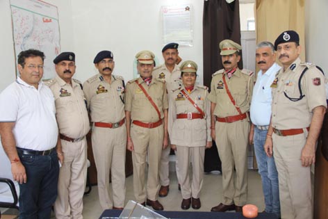 Police officers and promotees posing for a group photograph at Udhampur.