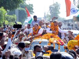 Devender Singh Rana & Surjit Singh Slathia being taken in a form of procession on their arrival in Jammu on Saturday. — Excelsior/Rakesh