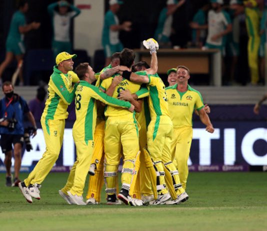Australian players celebrating victory over New Zealand during T20 World Cup final match at Dubai on Sunday.