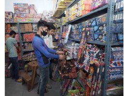 People buy crackers ahead of Diwali festival in Jammu. -Excelsior/Rakesh