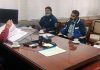 Advisor Farooq Khan charing a meeting on Friday.