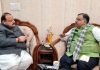 Senior BJP leader, Devender Singh Rana during a meeting with party national general secretary, Tarun Chug on Friday.