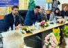Principal Commissioner of Income Tax with other dignitaries during outreach prog at Srinagar on Friday.