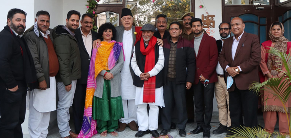 NC president Farooq Abdullah posing with JKNPP president Prof Bhim Singh at latter’s residence.
