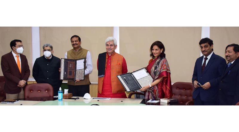Lieutenant Governor Manoj Sinha, Apollo Executive Vice Chairperson Dr Preetha Reddy and J&K bureaucrats during signing of MoU in Jammu on Tuesday.