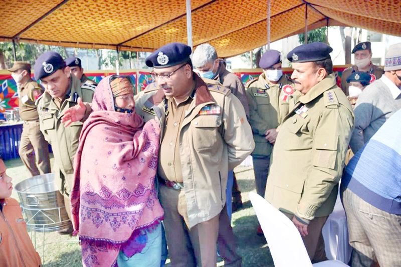DGP Dilbag Singh interacting with family member of a police martyr at DPL Kathua.