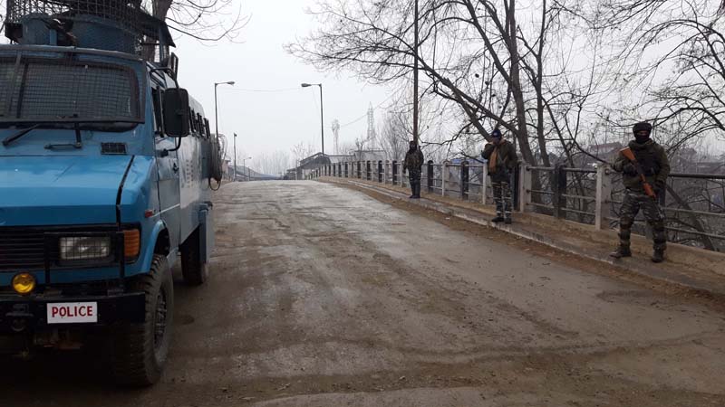 Troops at the site of encounter at Aarwani in Anantnag on Friday. -Excelsior/Sajad Dar