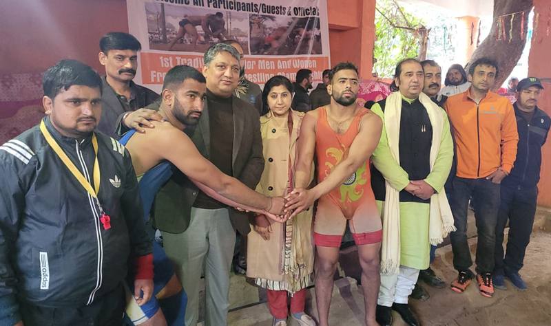Deputy Mayor and other dignitaries introducing wrestlers during the opening day of the championship at Jammu.
