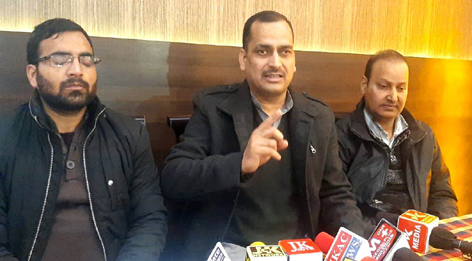 Advocate Sanjeet Baboria addressing a press conference at Udhampur on Sunday.