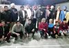 Winning team posing for group photograph alongwith dignitaries in Jammu on Saturday.