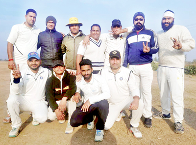 Winner posing for a group photograph at Sattowadi Cricket Ground R S Pura.