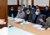 Chief Secretary AK Mehta chairing a meeting in Jammu on Monday.