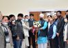 Gujjar-Bakerwal delegation presenting bouquet to LG Manoj Sinha in Jammu on Friday.