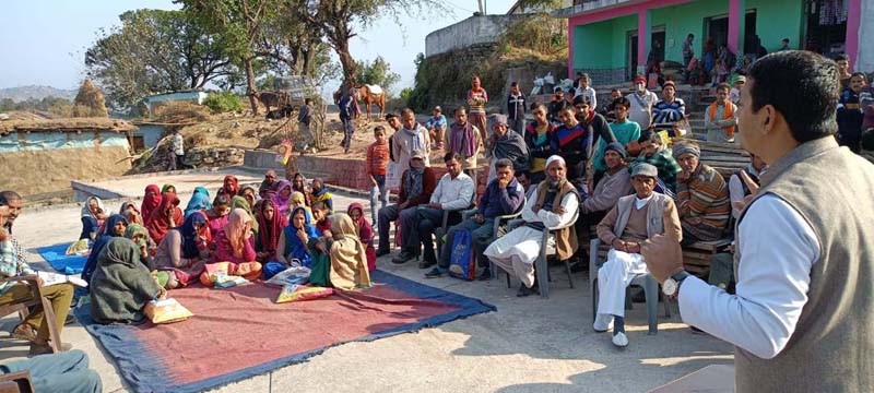 BJP spokesperson and former MLA, R S Pathania addressing a public meeting in Parli Dhar in Ramnagar area on Sunday.