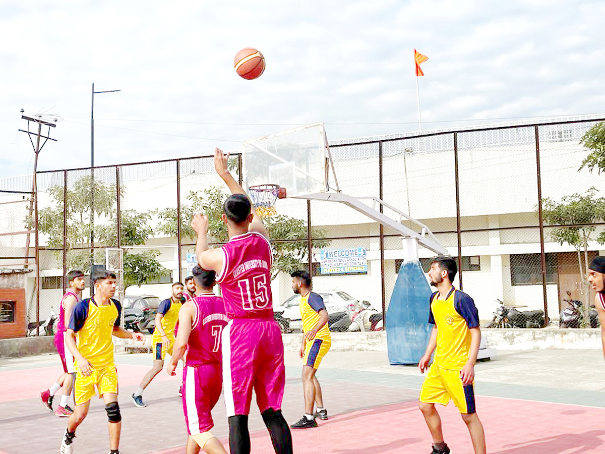 Players in action during a Basketball match at GGM Science College Ground Jammu.