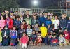 Selected players posing for a group photograph along with dignitaries at Jammu.