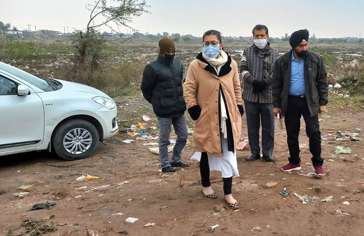 JMC Commissioner Avny Lavasa and other officers at dumping site in Bhagwati Nagar, Jammu.