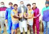 Players being awarded with trophies by a dignitary at Poonch.