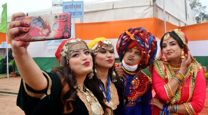 Artists from Jammu and Kashmir taking a selfie at Rashtriya Rangshala Camp on Saturday. They will perform in Republic Day Parade in New Delhi.(UNI)
