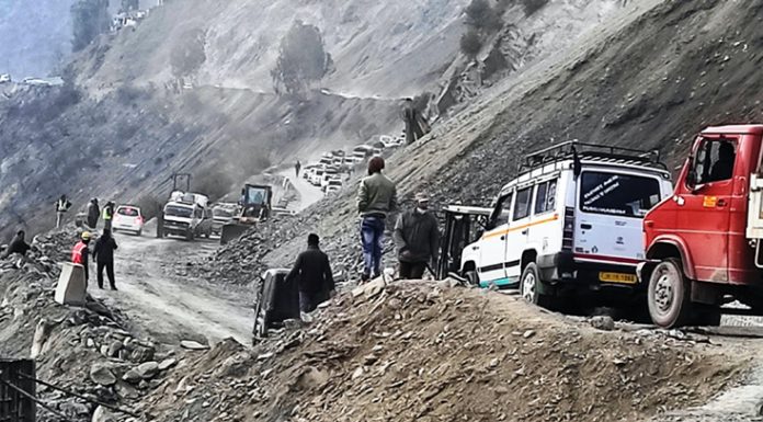 Vehicles on Jammu-Srinagar National Highway moving towards Jammu from Srinagar at Ramban. -Excelsior/Pervaiz