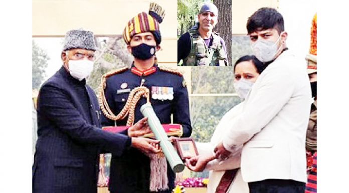 President Ram Nath Kovind awarding Ashok Chakra to ASI Babu Ram posthumously which is being received by his wife and son, residents of village Dharana, Mendhar. (Inset) ASI Babu Ram.