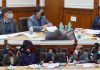 Chief Secretary, AK Mehta chairing a meeting at Jammu on Monday.