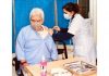 Lieutenant Governor Manoj Sinha taking COVID vaccine in Gandhi Nagar Hospital on Monday.