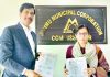 CEO JSCL Avny Lavasa and representative of RSB Projects Ltd showing copies of agreement in Jammu on Saturday.