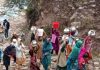 Women fetching water from river as there is no supply of drinking water to Mankote village in Poonch.