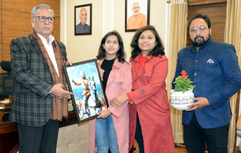 A delegation of trustees of General Zorawar Singh Trust offers portrait of the General to Advisor, Farooq Khan.