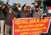 VRS given JKRTC workers staging protest demonstration near Press Club in Jammu on Tuesday. -Excelsior/ Rakesh