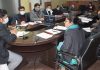 Divisional Commissioner Dr Raghav Langer chairing a meeting on Tuesday.