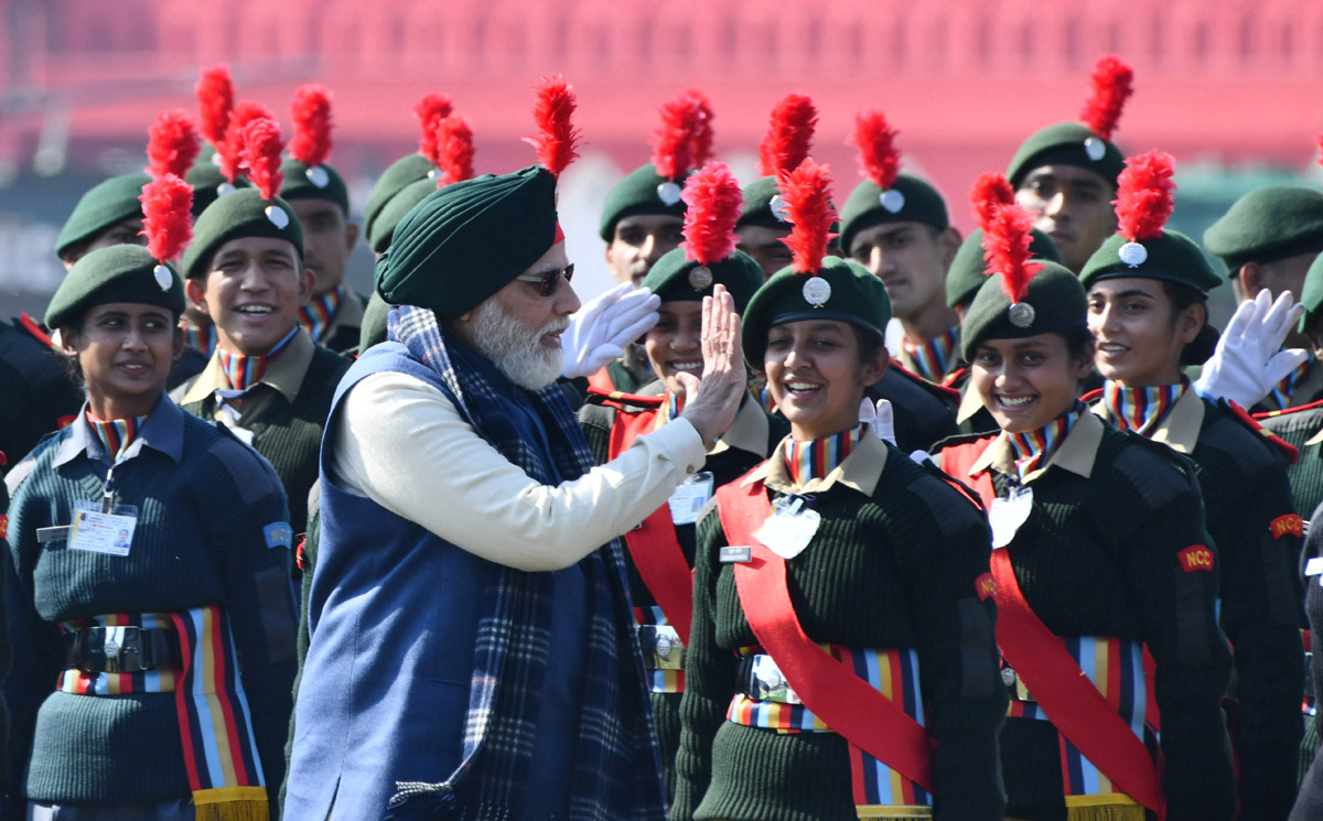 Prime Minister Narendra Modi interacting with NCC Cadats during his visit to address the Prime Minister's NCC rally, in New Delhi on Friday. (UNI)