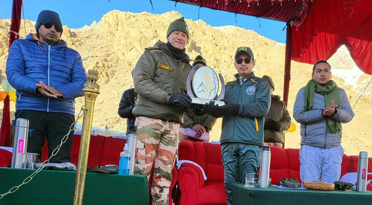 Ladakh MP, Jamyang Tsering Namgyal presenting award to winner of the Ice Climbing event in Leh.