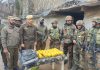 Police and Army personnel posing with seized narcotics in Poonch on Saturday.