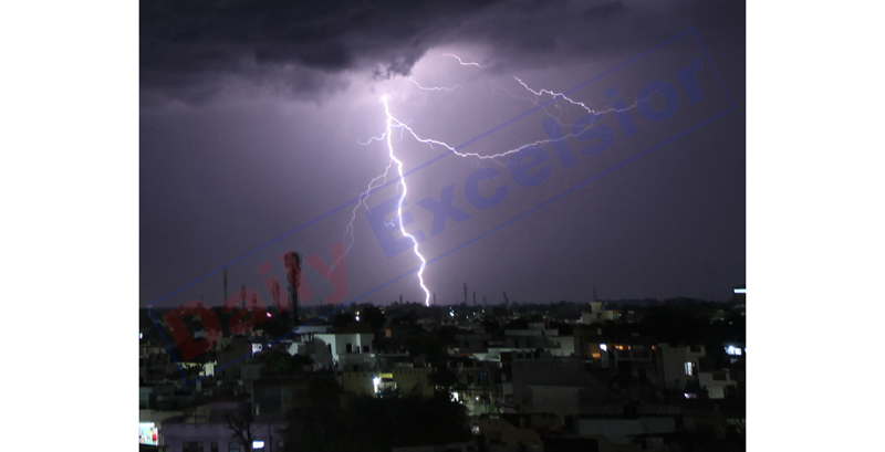 Lightning over Jammu City on Saturday night. -Excelsior/Rakesh