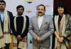 Union Minister Dr Jitendra Singh, flanked by Drone Show "StartUp" Co-founders Sarita Ahlawat,Tanmay Bunkar and Anuj Kumar, during the felicitation ceremony,at New Delhi on Wednesday.