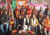 MP, Jugal Kishore Sharma posing for a photograph with party activists in Rajouri on Saturday.