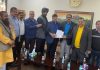 Narwal Mandi traders submitting charter of demands to CCI president in Jammu on Saturday.