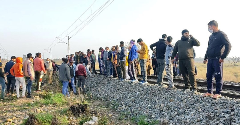 Irate people protesting on Railway track Ghagwal with dead body on Monday. -Excelsior/Nischant