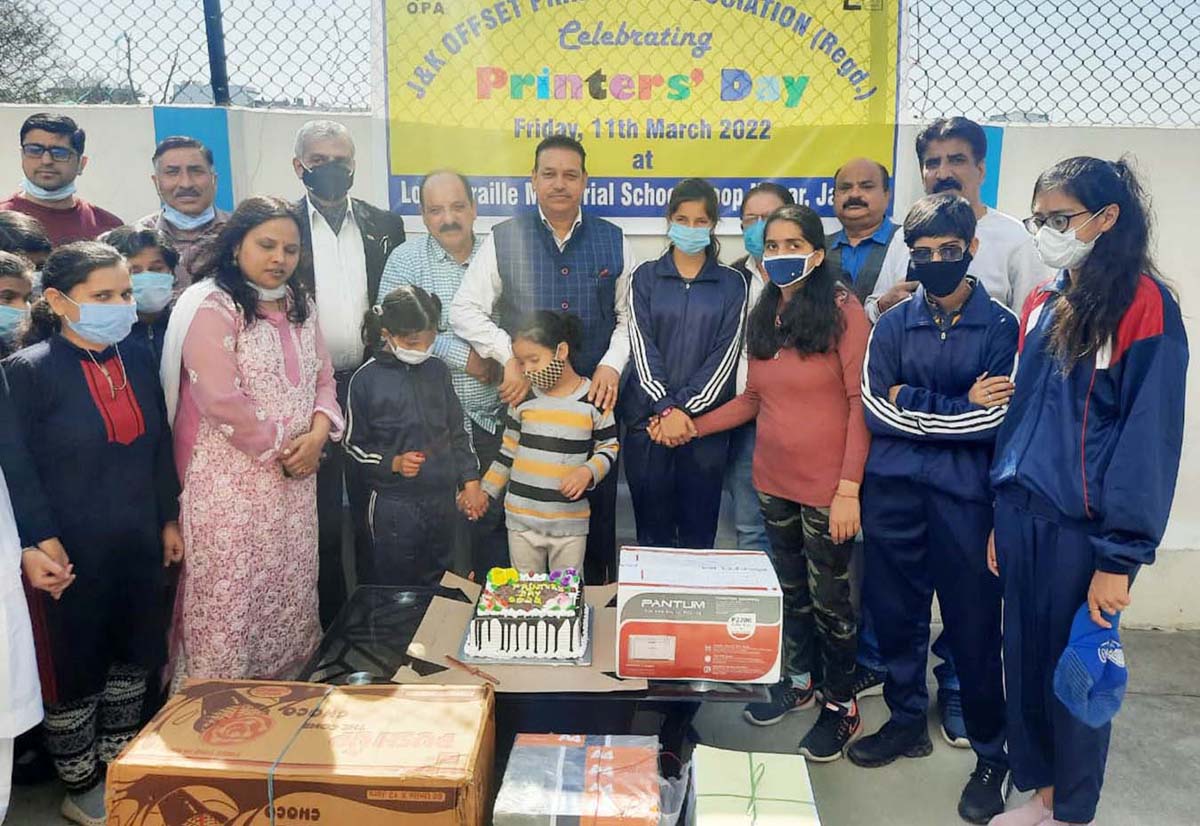 JKOPA members celebrating Printers' Day with children of Louis Braille Memorial School at Roop Nagar.