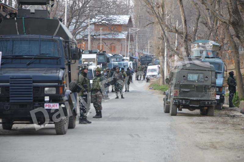 Security forces near encounter site at Pulwama. -Excelsior/Younis Khaliq
