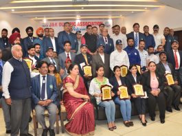 Sports Awardees posing for a group photograph with dignitaries at Amar Singh Club Jammu on Tuesday.