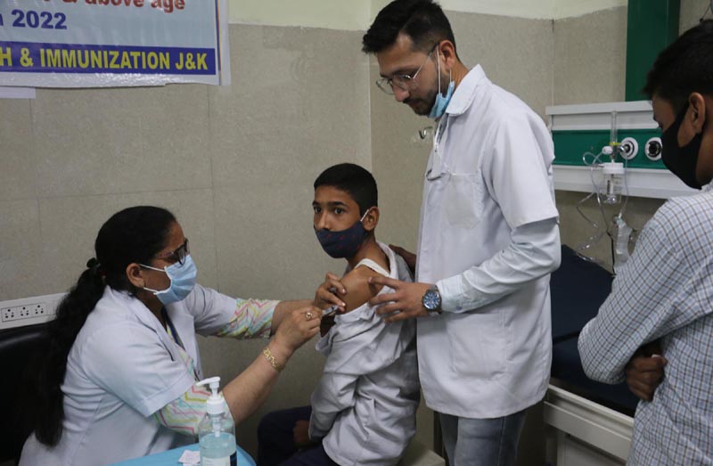 A student being administered COVID-19 vaccine. —Excelsior/Rakesh