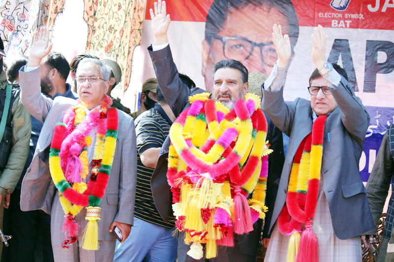 Altaf Bukhari, GH Mir and others at Apni Party workers convention at Shopian on Sunday.