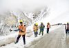 BRO men working on Srinagar-Leh highway on Saturday. -Excelsior/Shakeel