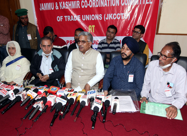 Senior members of JKCCTU talking to media-persons in Jammu on Saturday. -Excelsior/Rakesh