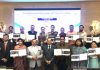 Union Minister Dr Jitendra Singh with Municipal Corporators and Councillors of the Jammu region holding their Course Completion Certificates at the valedictory ceremony of the 3-day Orientation Programme on Urban Governance, organised by IIPA, at New Delhi on Friday.