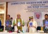 Lt Governor Manoj Sinha releasing a book.