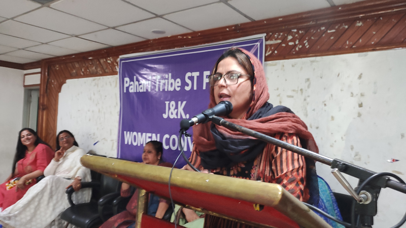 Safina Beig addressing women convention by Pahari ST Forum at Jammu on Wednesday.